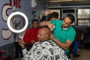 Uplift Communities barber workshop